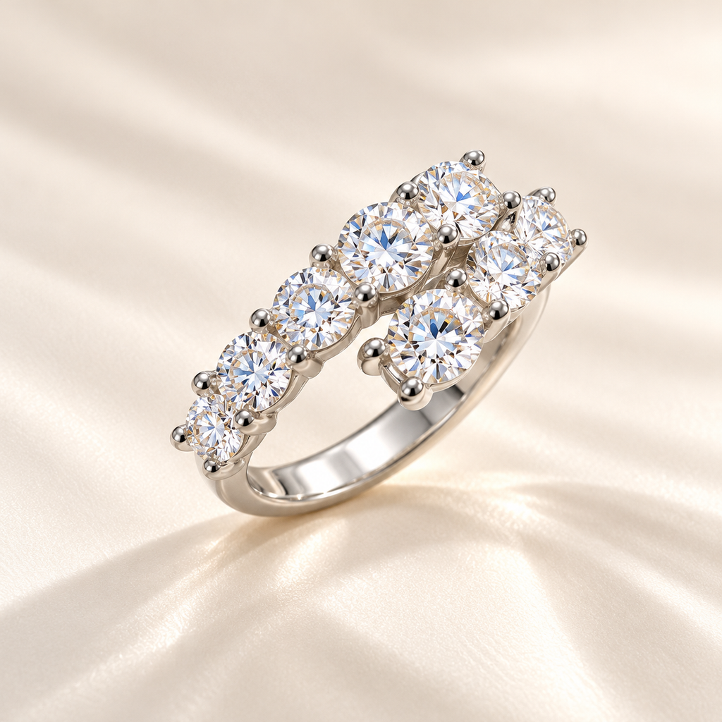 Marla Jewellery elegant silver-tone double-row ring featuring sparkling round-cut crystals in a polished setting, photographed on a luxurious cream background.
