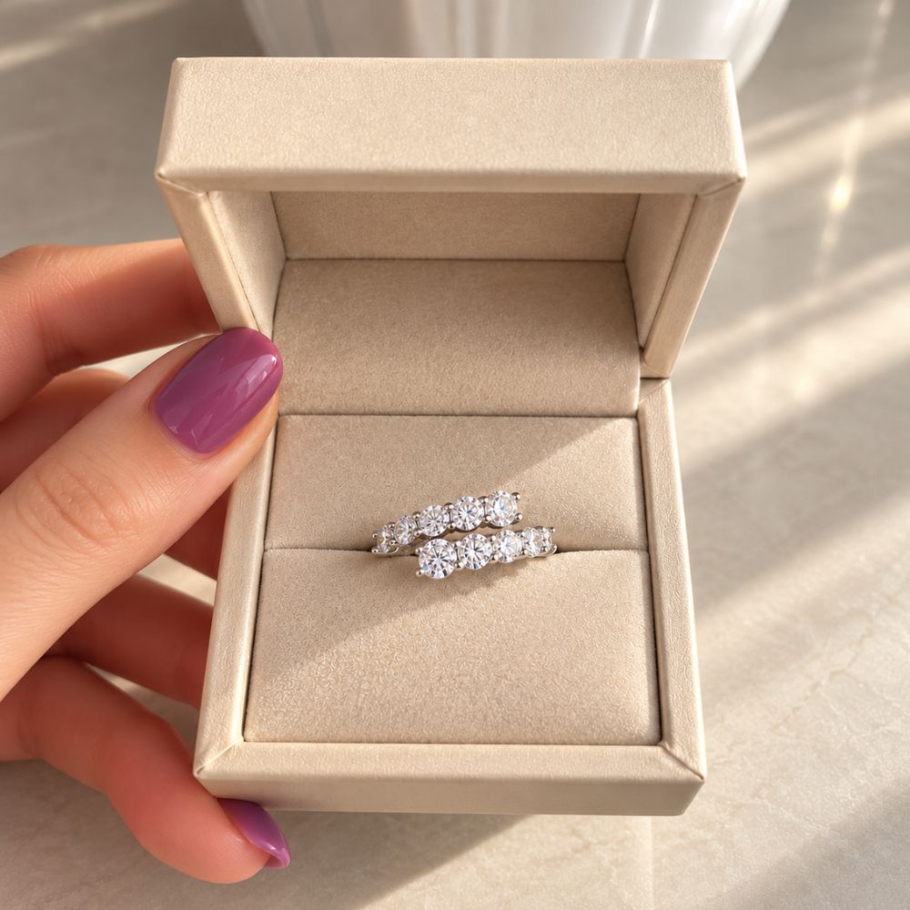 Marla Jewellery sparkling double-row crystal ring displayed inside an open beige velvet jewellery box, showcasing its elegant silver-tone setting.